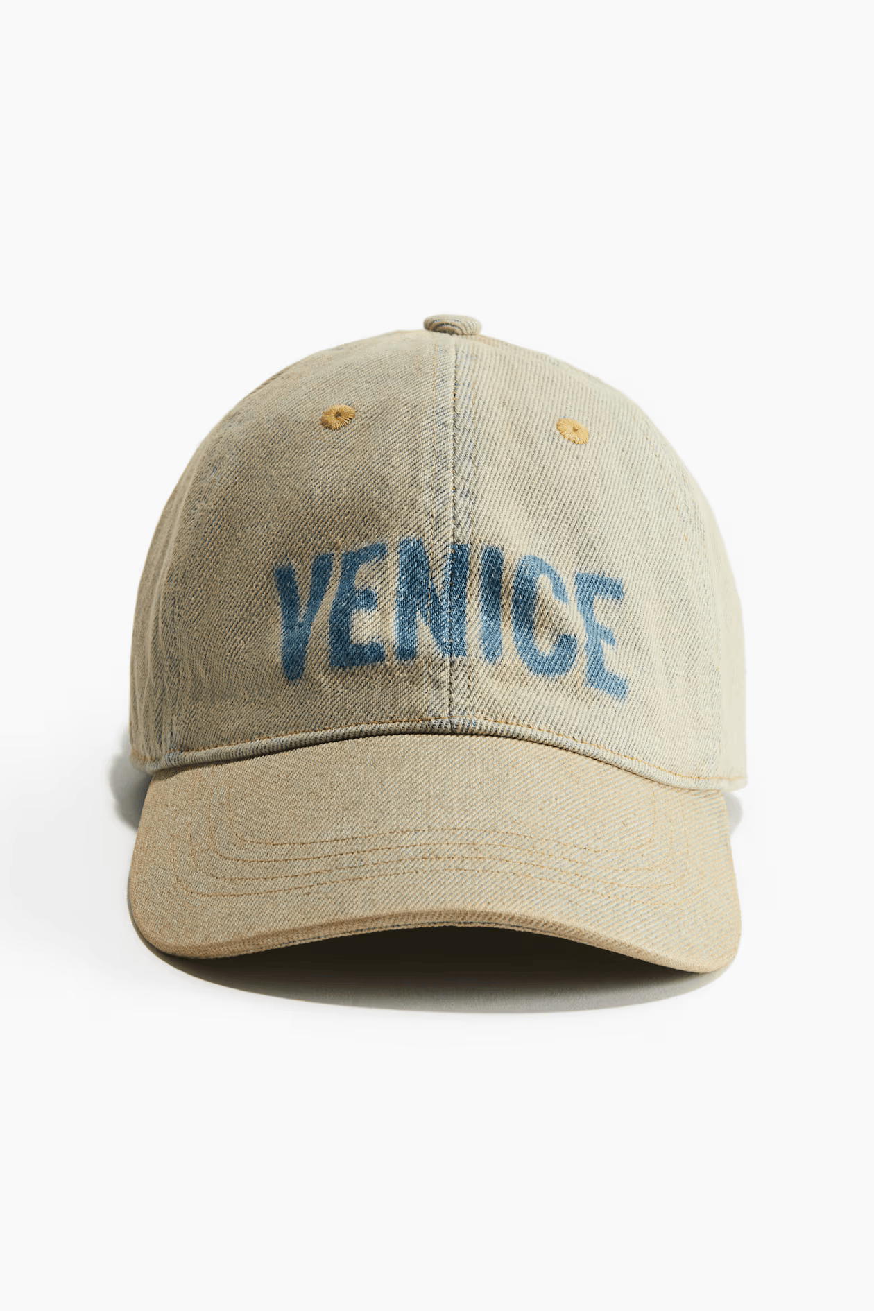 Cap with hard-worn details